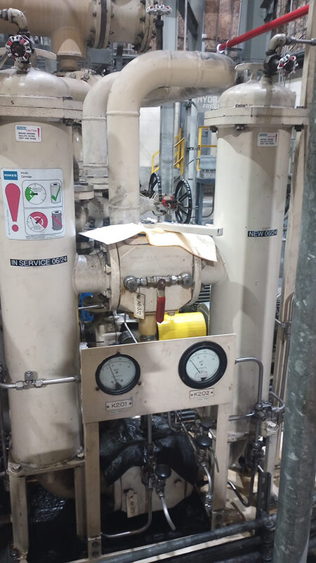 Lagged Vokes duplex filter unit with changeover valve and differential pressure gauges